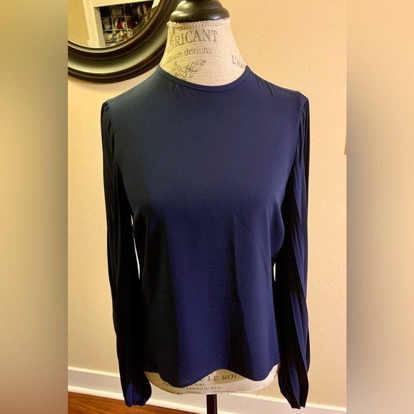 NWT NAVY BLUE BLOUSE. ACCORDION SLEEVES MAKE THIS A STAND OUT BEAUTIFUL BLOUSE. - Picture 2 of 9